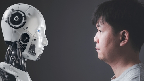 The faces of human and a robot