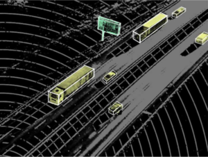 LiDAR point cloud of a highway showing 3D bounding boxes around trucks and cars.