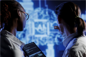 Two professionals analyzing AI data on a digital screen together